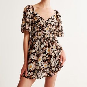 NWT - Angel Sleeve Smocked Waist Mini Dress